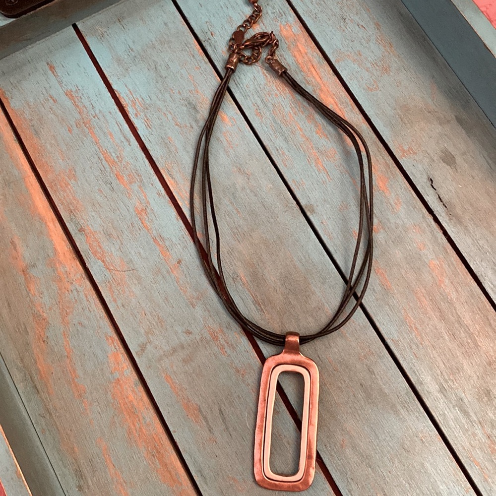 Bronze/copper necklace with triple leather band. Never worn.